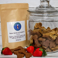 Load image into Gallery viewer, Close-up of strawberry peanut butter dog treats showing crunchy texture, made with natural ingredients.