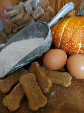Load image into Gallery viewer, Handmade organic pumpkin dog treats baked in small batches, made with natural Farm-to-Paw ingredients for healthy dog snacking.