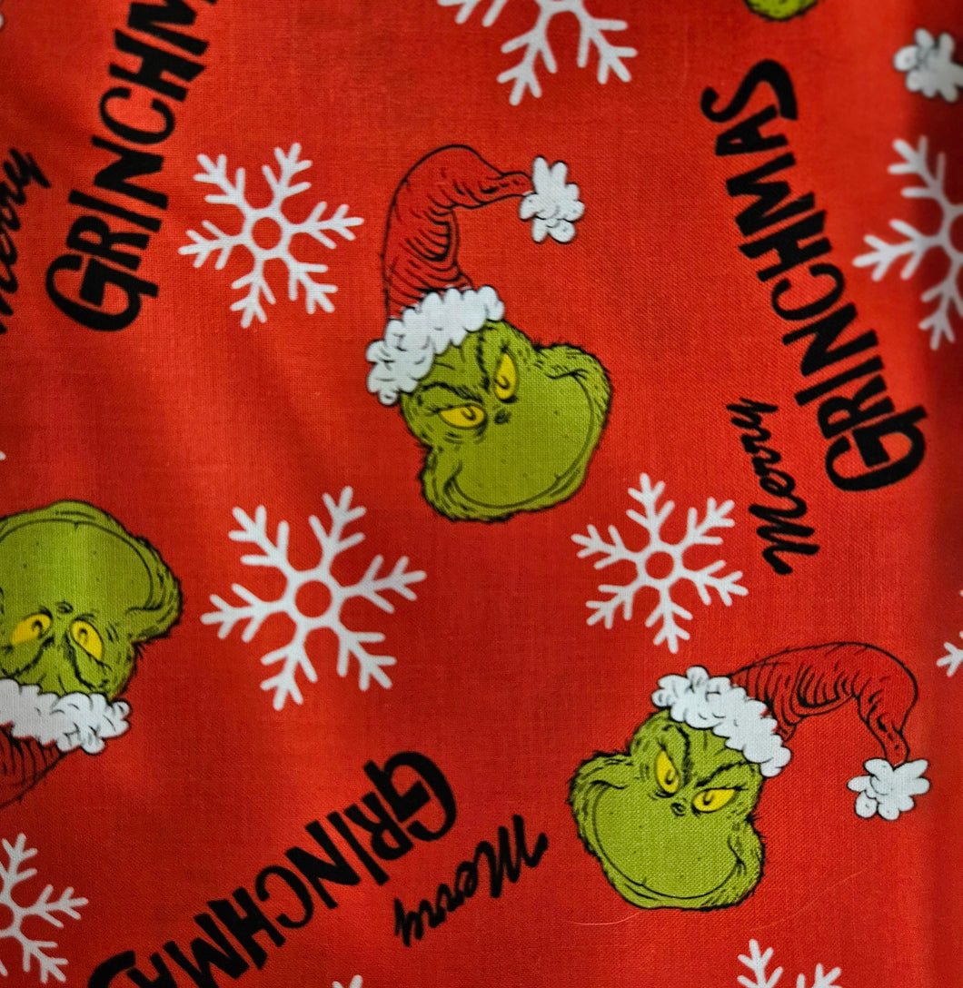 Dog bandana  heads, Santa hats, and snowflakes on a red background