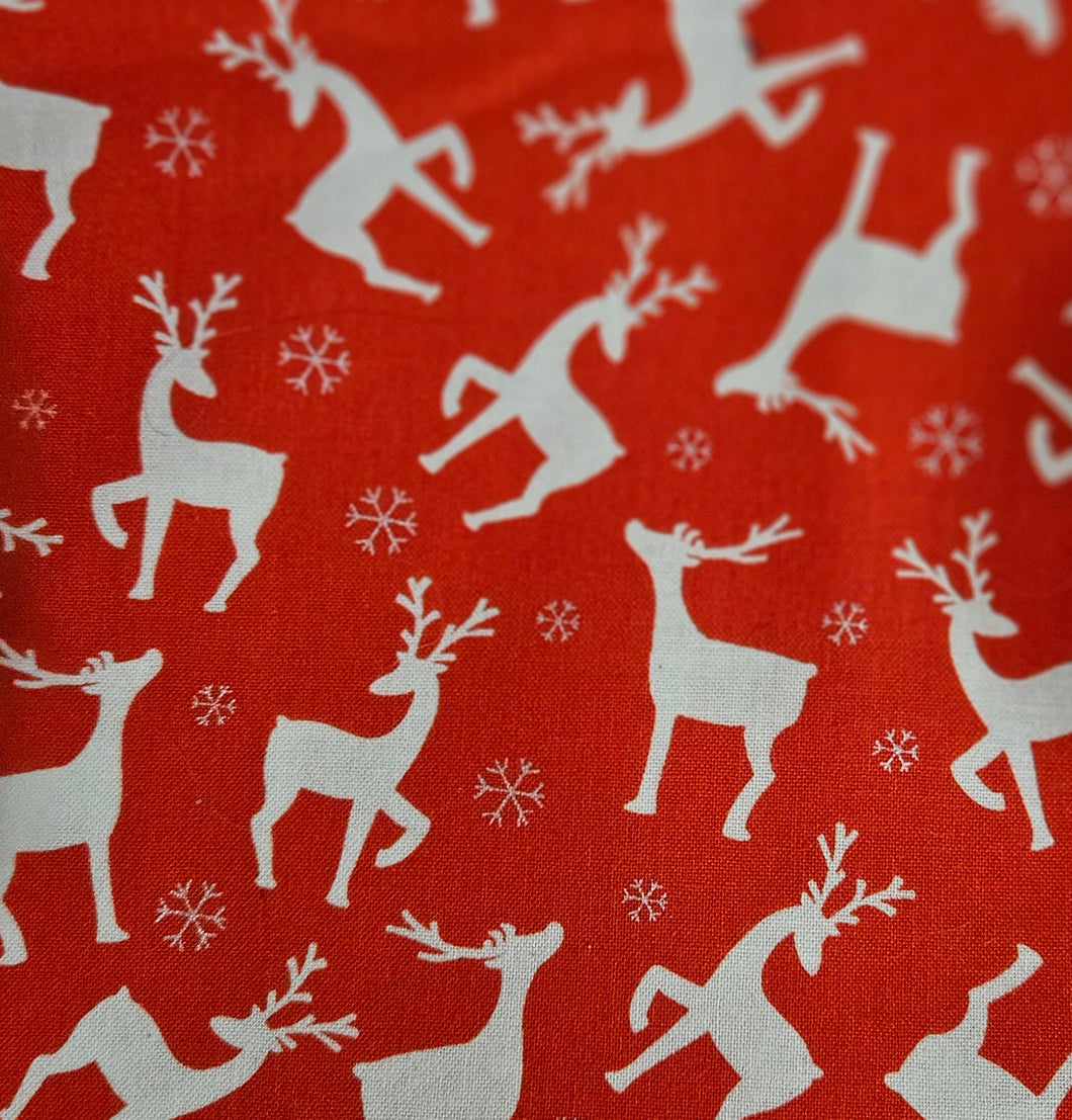 Dog bandana with white reindeer and snowflake pattern