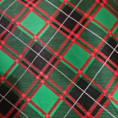 green, black, and red plaid fabric dog bandana